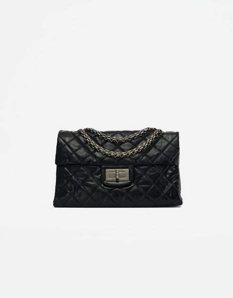 Un Chanel 255 large en Vinyl d'occasion